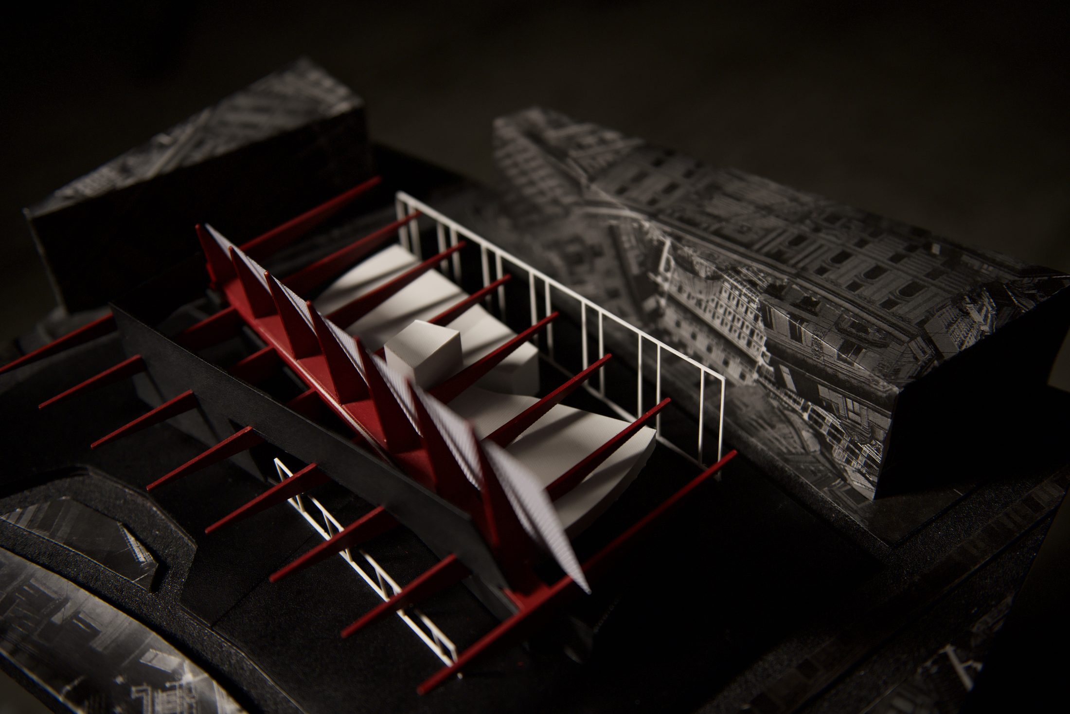 Site model close-up detail red fins and white auditorium pieces